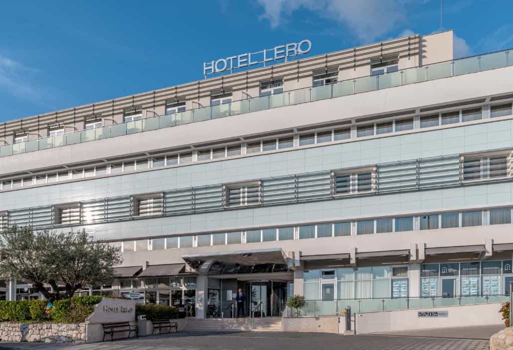 Hotel Lero building exterior with modern facade and blue sky overhead