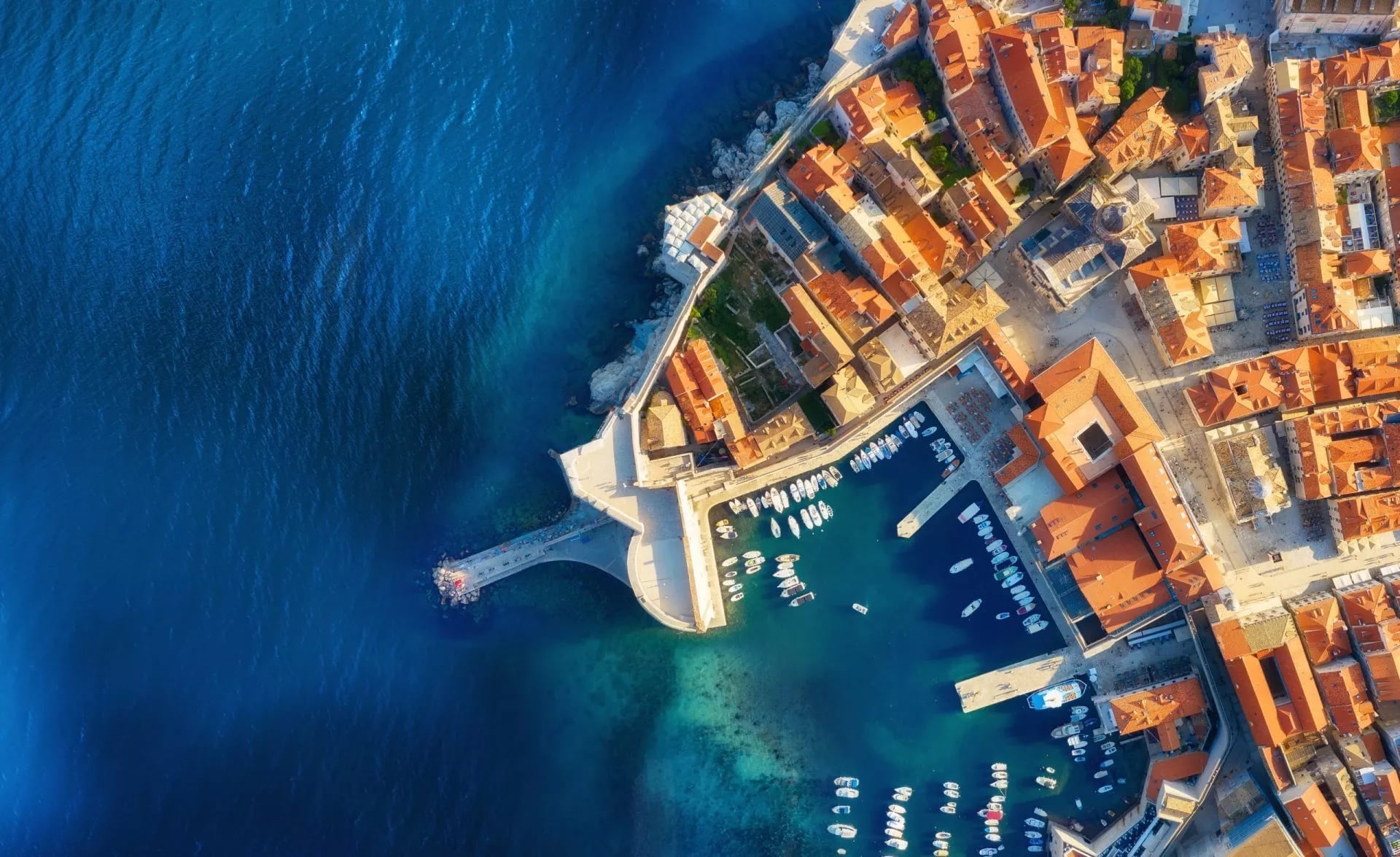 Dudrovnik, Croatia. Aerial view on the old town. Vacation and adventure. Town and sea. Top view from drone at on the old castle and azure sea. Travel - image