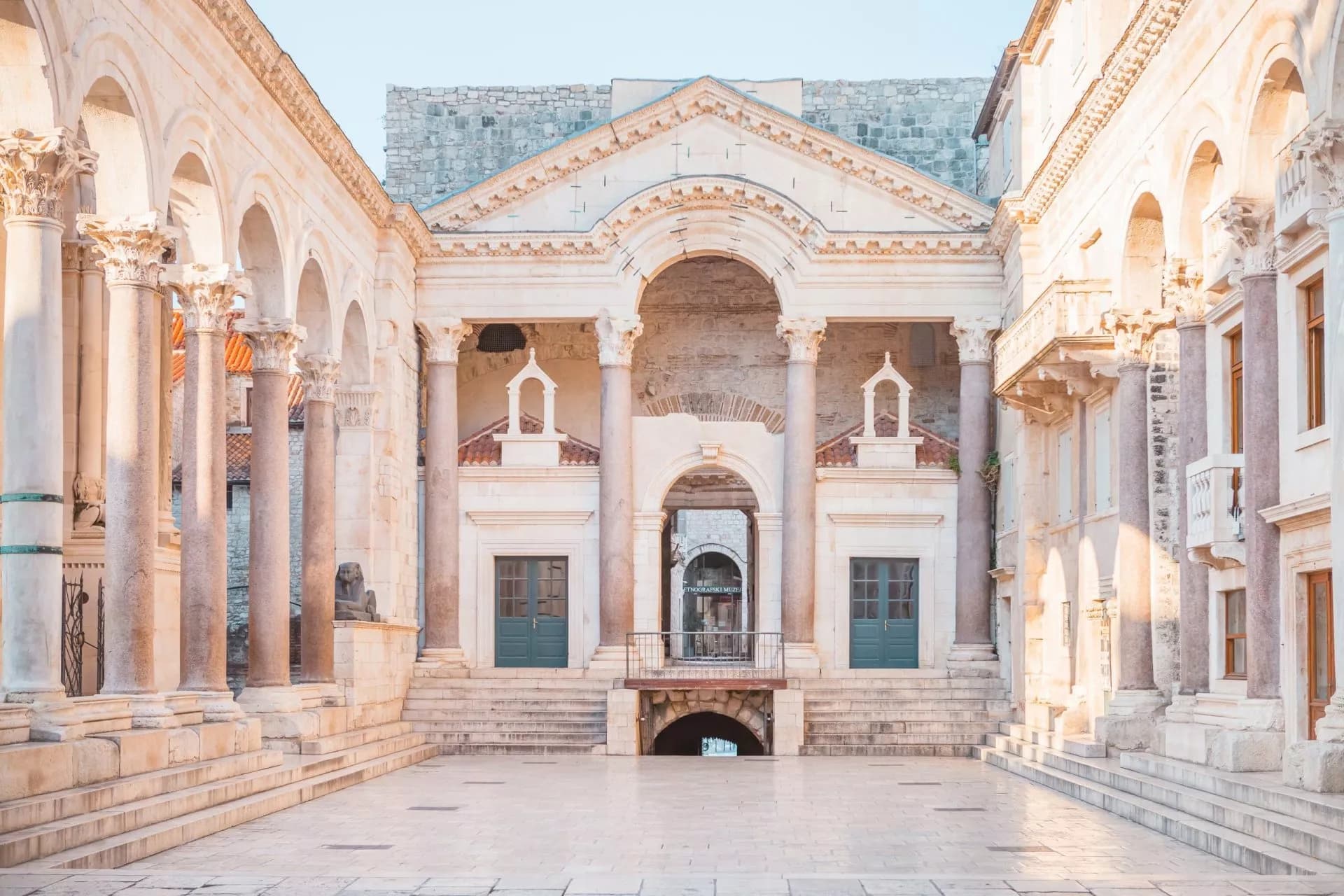 Roman Emperor Diocletian's Palace courtyard with colonnades in Split, Croatia.